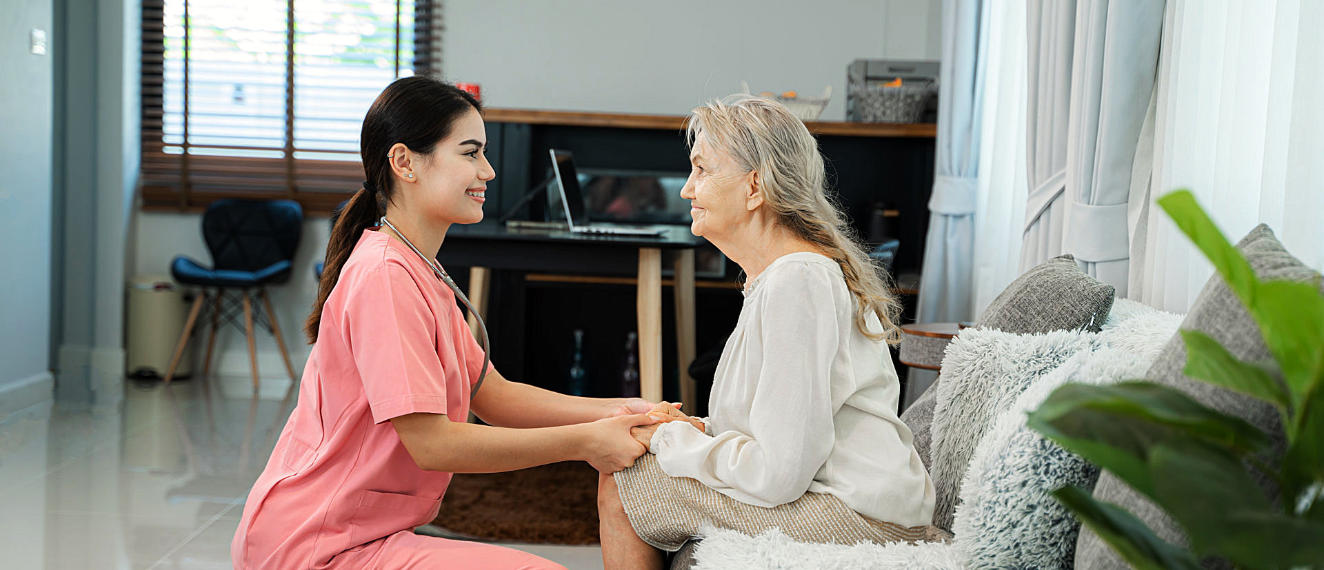 caregiver and senior woman talking
