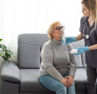 nurse checking on elder